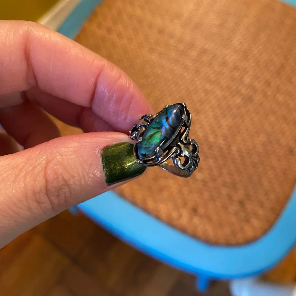 Silver Tone Costume Jewelry Ring with Blue Swirl Jewel Design